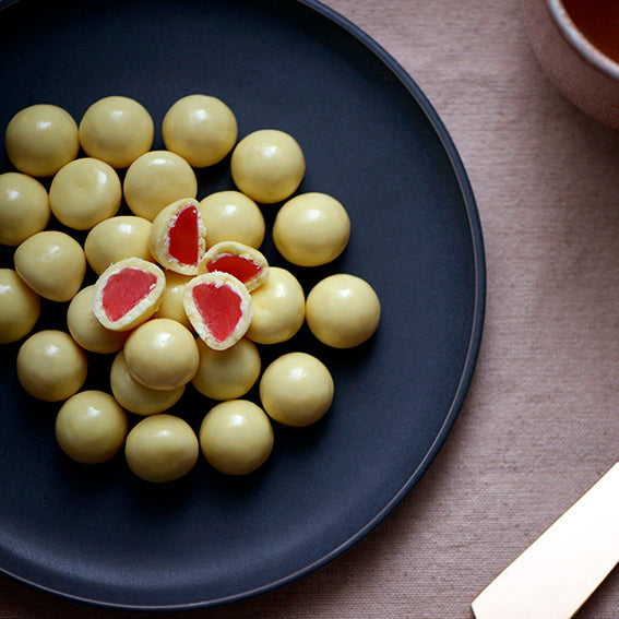 White Chocolate Raspberries, Melbourne-made chocolate-coated raspberry lollies from Sweet Addiction Confectionery
