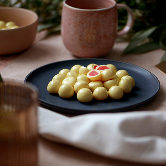 White Chocolate Raspberries, Melbourne-made chocolate-coated raspberry lollies from Sweet Addiction Confectionery
